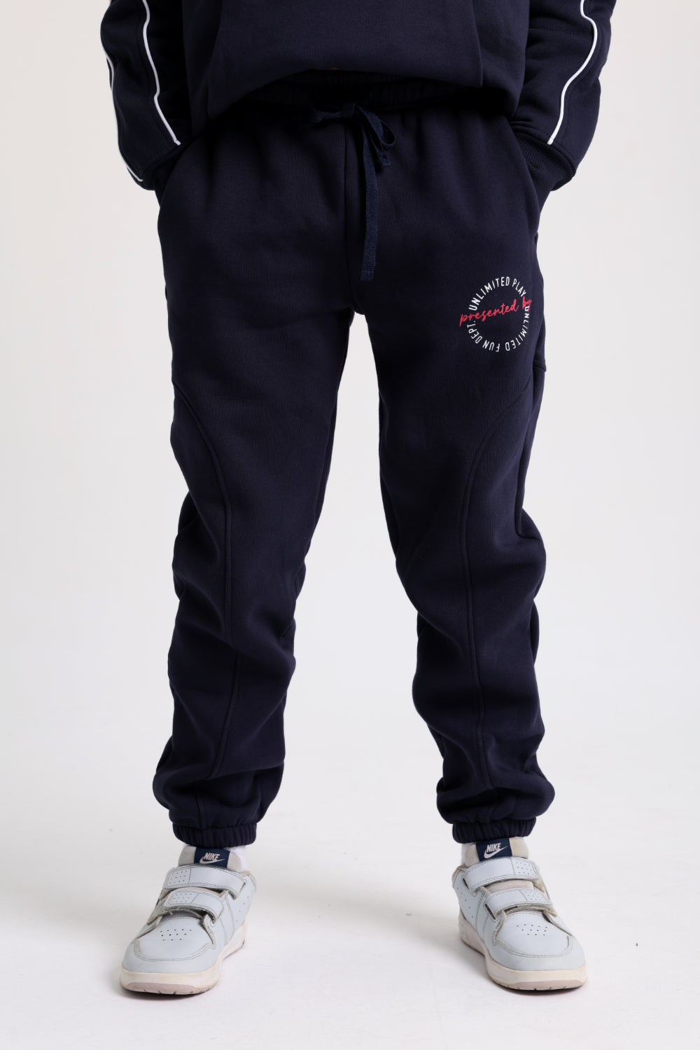 cotton sweatpants – navy with "unlimited play presented by unlimited fun dept" print