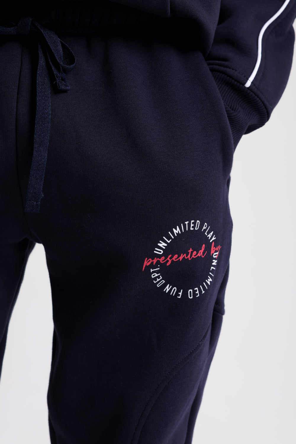 cotton sweatpants – navy with "unlimited play presented by unlimited fun dept" print