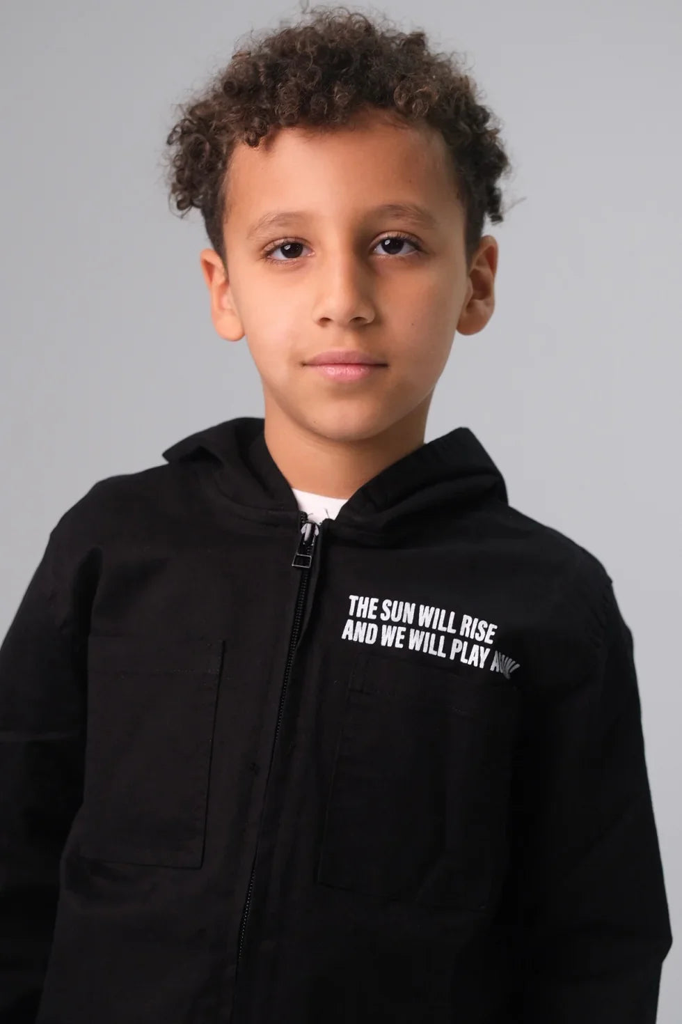 unisex "the sun will rise" gabardine jacket – black - playmore