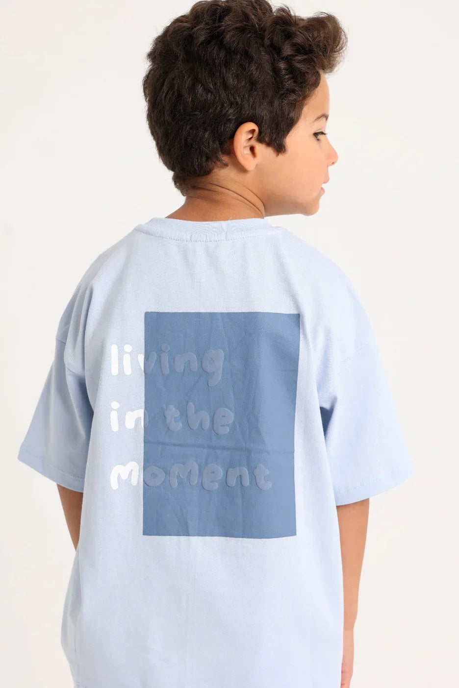 unisex kids cotton t-shirt – baby blue "living in the moment" - playmore