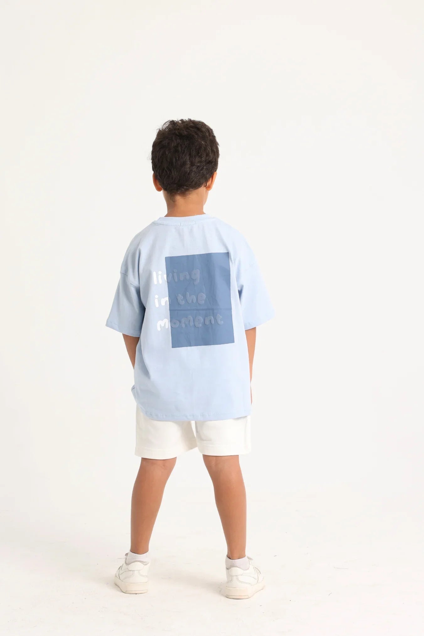 unisex kids cotton t-shirt – baby blue "living in the moment" - playmore