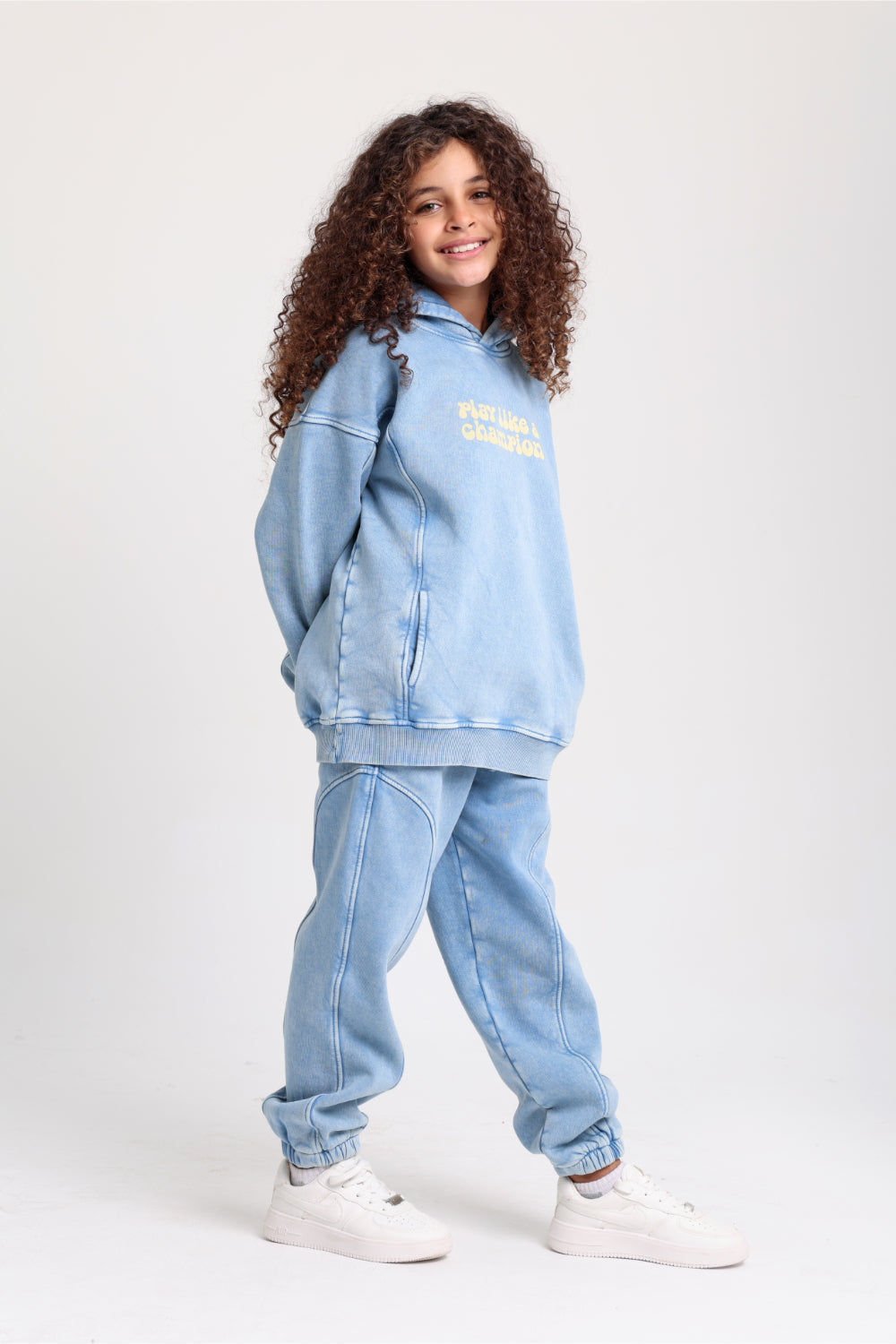 teens cotton hoodie – baby blue with "play like a champion" design